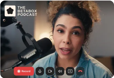 Woman speaking into a Shure microphone during a podcast recording, with The Betabox Podcast logo.
